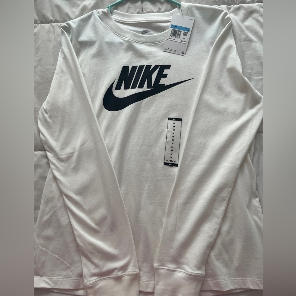 Women’s Nike white long sleeve.
